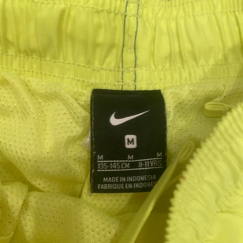 Nike boys swim trunks size M (9-11 y) & Cat & Jack rashquard shirt size M 8-10y